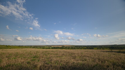 A stunningly beautiful landscape showcasing impressive fields under a clear blue sky