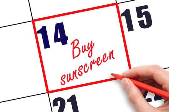 14 th day of the month.  Hand writing Buy sunscreen reminder and drawing red frame on calendar. Concept skin care, health care. Travel planning concept. Planning and scheduling