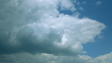 The stunning Dynamic Cloud Formation Can Be Clearly Seen Floating Above A Clear, Bright, Blue Sky