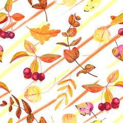 October paints. Seamless watercolor pattern of colorful autumn leaves and twigs with decorative apples on a background of yellow-orange strokes.