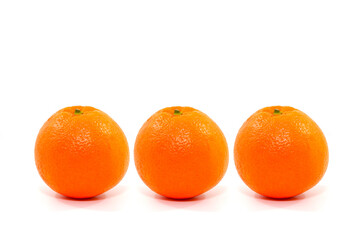 fresh oranges together isolated on white background closeup view