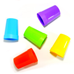 plastic tumblers layered together closeup view on white background 