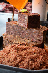 Butcher Stalls selling prepared meat for making tacos at the San Juan market in Mexico City.