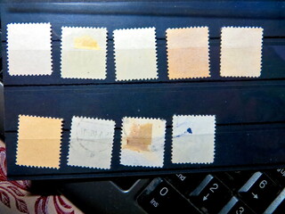 A Captivating Display of Vintage Postage Stamps Highlights Their Unique Reverse Sides