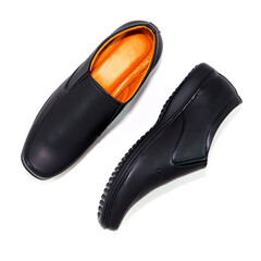 Formal black shoes pairing together isolated on white background close-up view