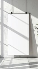 Blank White Poster Mockup Hanging Against Concrete Wall with Shadow and Plant