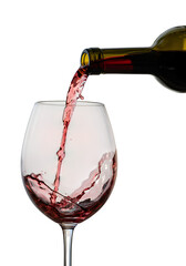 A stream of red wine is being poured into a clear glass captures a moment of elegance and is ideal for beverage, celebration, or restaurant-related designs 