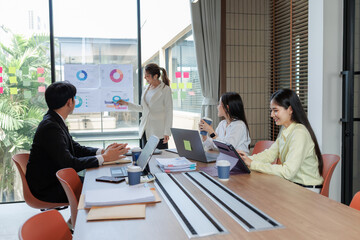 Team discussing strategies for marketing and investment planning.