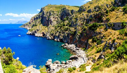 Coastal landscape with turquoise water and rugged cliffs