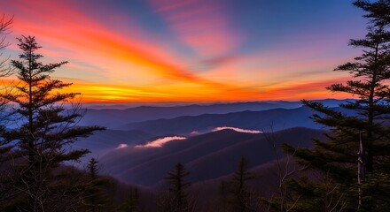 Obraz premium Majestic Sunset Over Mountain Range with Pine Trees.