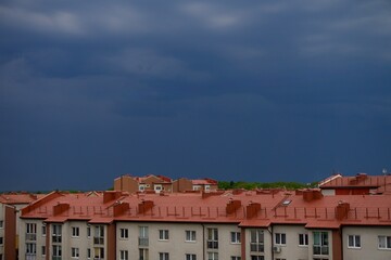 A cloud over the city in summer