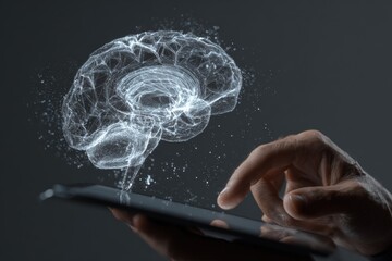 Hand interacting with a digital brain projection on a tablet