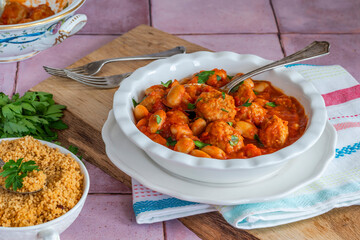 Pork meatballs in tomato sauce with couscous
