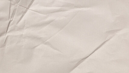 A close-up view of wrinkled, light-colored paper showcases its unique texture and subtle...