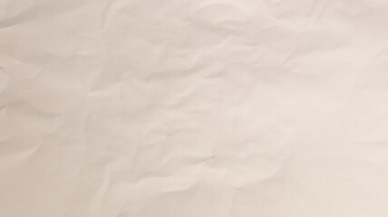 A softly crumpled beige background provides a warm and inviting texture, perfect for artistic projects or creative design, enhancing visual appeal with its simplicity