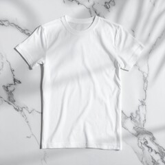 White T-Shirt Mockup Flat Lay on Marble Surface with Clean Shadows and Minimalist Style