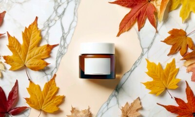  Cosmetic jar surrounded by colorful autumn leaves on a marble surface. Vibrant maple leaves in shades of red, orange, and yellow frame the minimalist jar, creating a seasonal visual appeal.