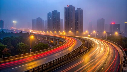 Urban highway at dusk with light trails and city skyline