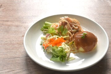 baking spaghetti slice ham pork with vegetable topping shrimp egg in mayonnaise cream sauce salad couple mashed potato on plate   