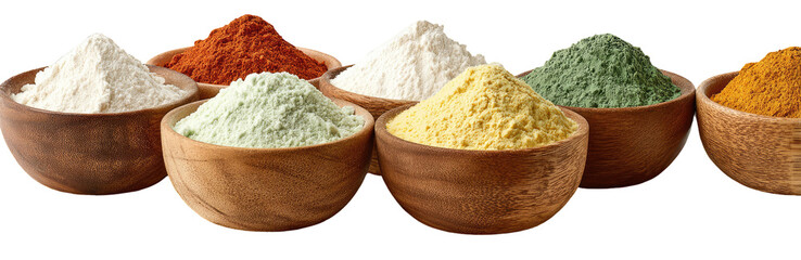 Wooden bowls filled with various colorful powders