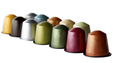 Colorful coffee pods displayed in a row on a white isolate background.