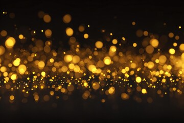 Abstract gold glitter bokeh on a dark background