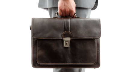 Professional man holding a sleek leather briefcase, ideal for corporate or business settings.