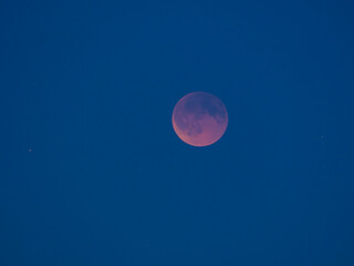 Blood moon and clouds
