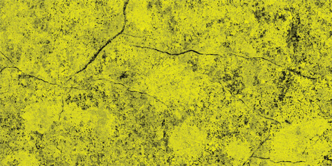 Abstract yellow grunge texture featuring cracks and speckled surface design for backgrounds or decorative elements