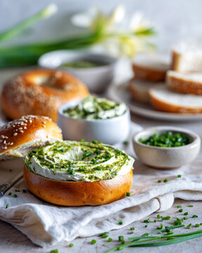 Toasted Bagel with Pesto Flavored Cream Cheese Spread