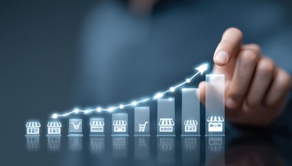 Hand pushing up a graph showing growth in online store sales