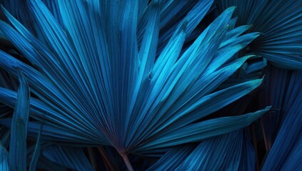 Obraz premium Vibrant blue tropical leaves