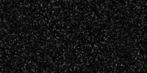 Fototapeta premium Snowfall Bokeh Lights on Black Background, Shot of Flying Snowflakes in the Air. Falling snow isolated on pure black background. Shiny luxury black glitter texture surface background.