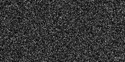 Fototapeta premium Snowfall Bokeh Lights on Black Background, Shot of Flying Snowflakes in the Air. Falling snow isolated on pure black background. Shiny luxury black glitter texture surface background.