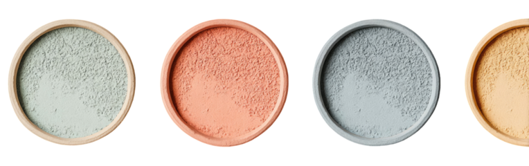 Four circular, textured discs in varying shades of muted earth tones