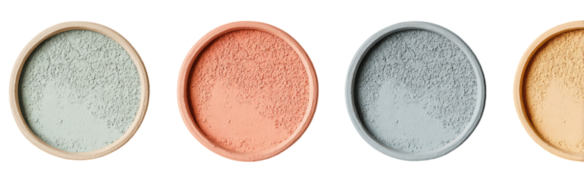 Four circular, textured discs in varying shades of muted earth tones - Powered by Adobe