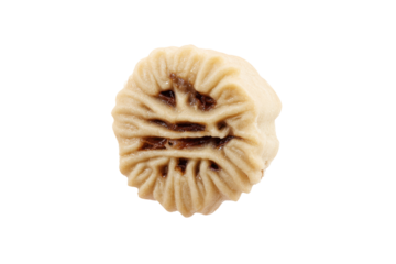 Close-up of a light beige dumpling, showing intricate, raised,  patterned surface.  Darker brown marks are visible within the pattern.  Isolated against black background
