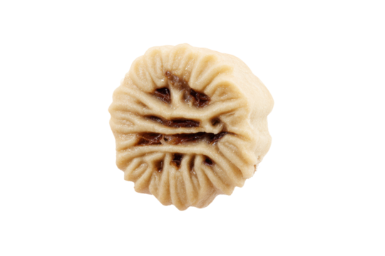 Close-up of a light beige dumpling, showing intricate, raised,  patterned surface.  Darker brown marks are visible within the pattern.  Isolated against black background