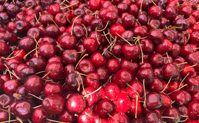 Many cherry fruits pattern. Red berry texture