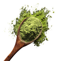 Green powder in wooden spoon, scattered