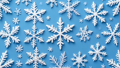 白い雪の結晶パターン｜青い背景