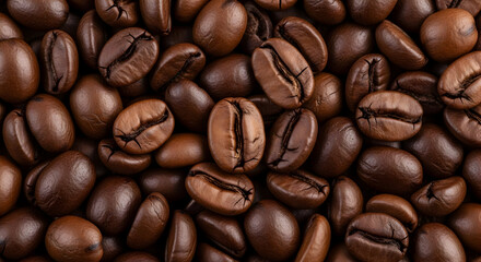 Obraz premium Roasted coffee beans background showcasing the rich aroma and texture in detail