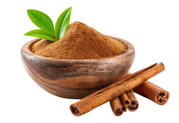 Cinnamon powder in wooden bowl with cinnamon sticks and green tea leaves