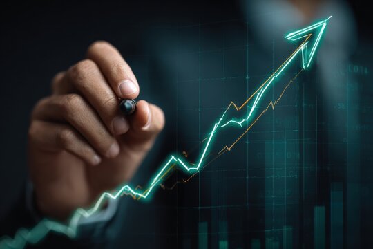 Business person drawing a rising graph - Powered by Adobe