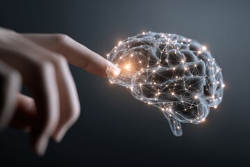 Hand touching a digital brain