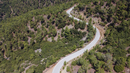 Aerial view of a road in Troodos Mountains on sunny summer day. Cyprus.
