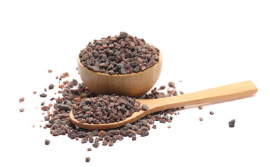 Pile black salt or Kala Namak in bamboo bowl and wooden spoon isolated on white background, side view