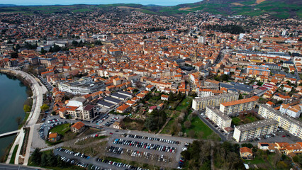 An aerial panoramic view around the old town of the city Millau in France on a sunny day in early spring