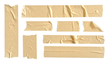 Torn pieces of light beige masking tape