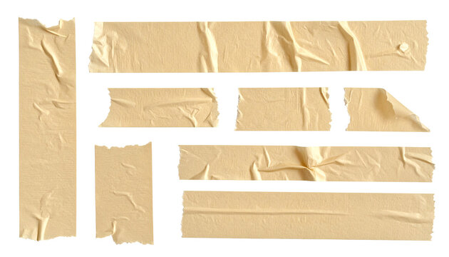 Torn pieces of light beige masking tape